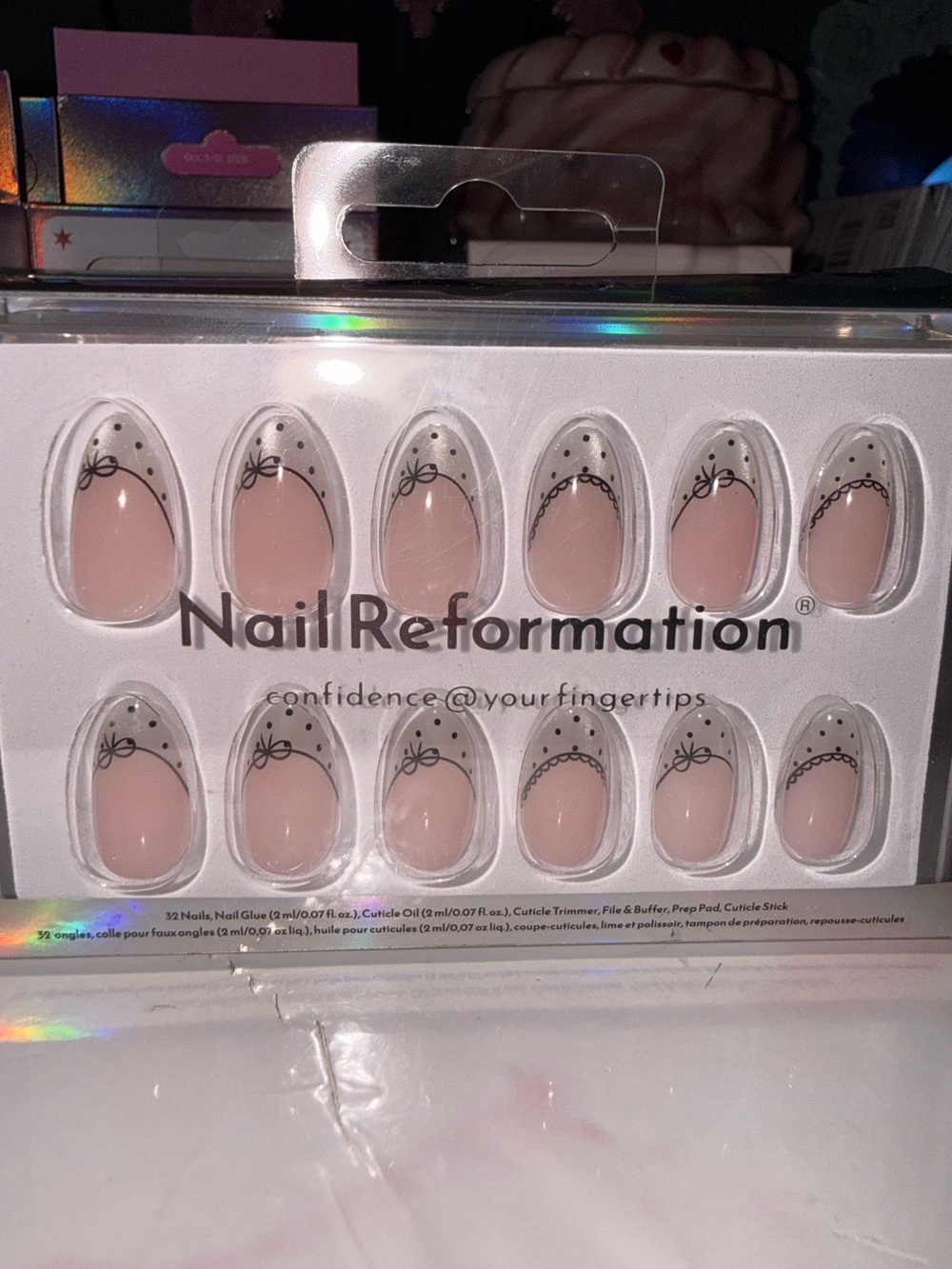 Nail Reformation Blush Pink Press-On Nails with Black Bow with Polka Dot Accents